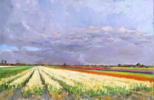 Rob Jacobs schildert bloemenvelden van Egmond op een doek van 120x80cm in Noord-Holland.