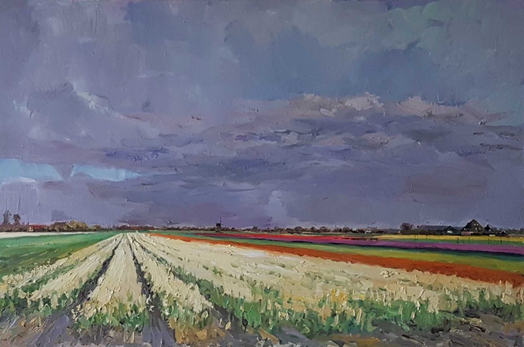 Rob Jacobs schildert doek van 80x120cm, bij de bollenvelden, in Egmond aan den Hoef, Noord-Holland.