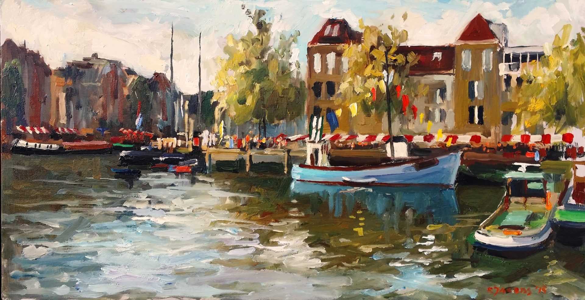 Rob Jacobs schildert doek tijdens het Furieade evenement in de haven van Maassluis, Zuid-Holland.