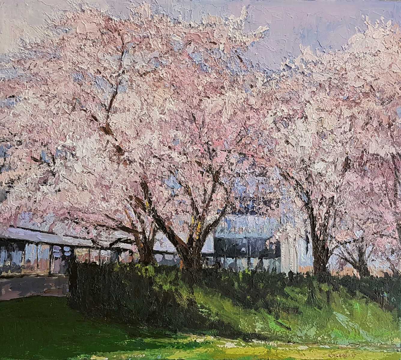 Rob Jacobs schildert doek van bloeiende boomgaard bij ABNAMRO.