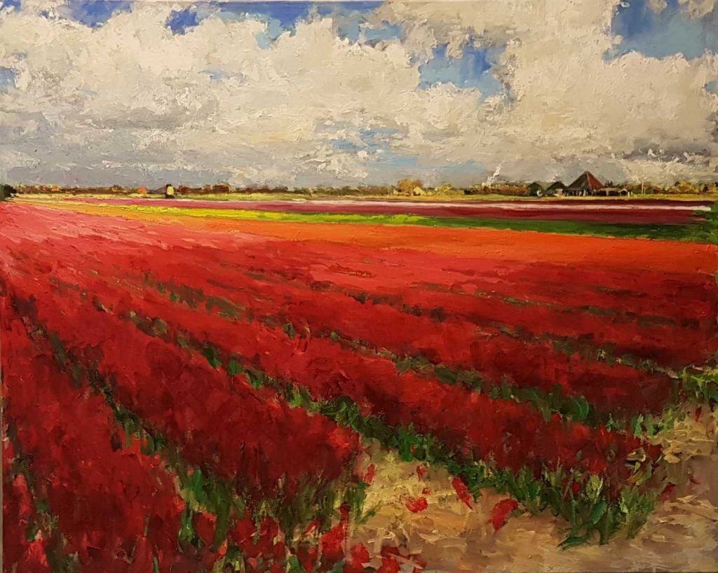 Rob Jacobs schildert doek van 80x100cm oil tijdens de zonsondergang bij Egmond ad Hoef bollenvelden.