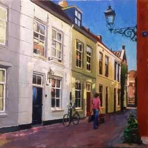 Rob Jacobs schildert doek van 40x40cm, tijdens zonnige dag, in Noord-Brabant in het Kruisbroederstraatje.